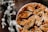 A freshly baked pie with a golden-brown crust intricately designed with leaf patterns, sitting on a wooden table. Parts of the filling, composed of sliced fruits, are visible through the lattice of the crust. A blurred bouquet of flowers is present in the foreground, adding a touch of greenery.
