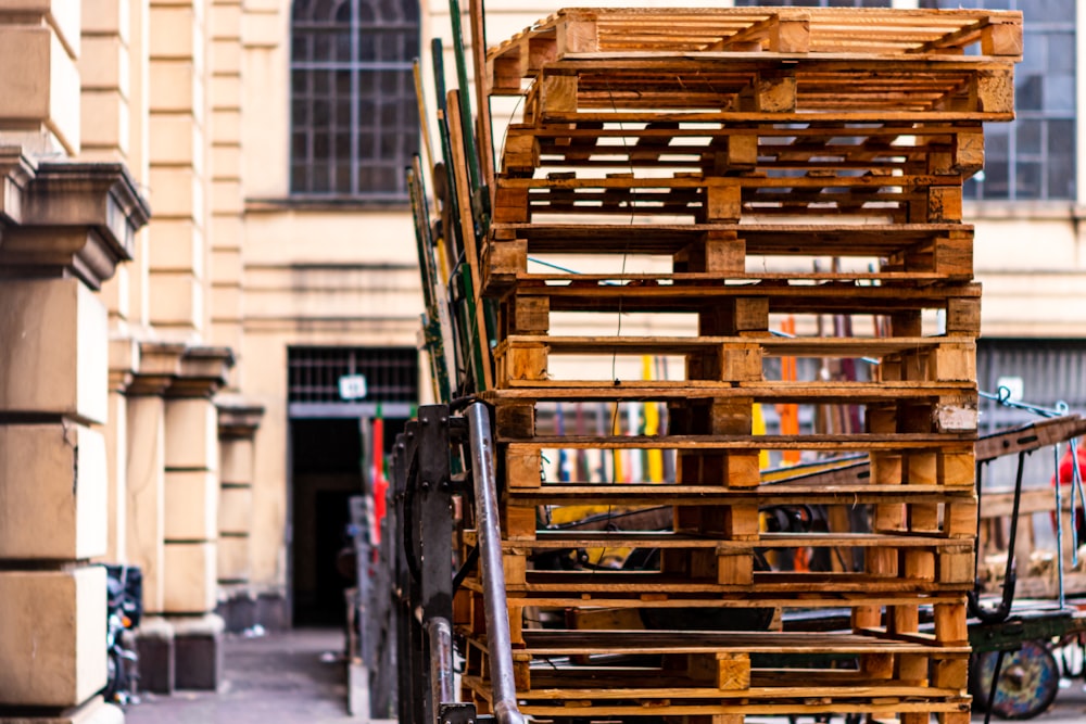 brown wooden shelf on street during daytime