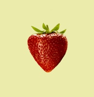 red strawberry fruit with white background