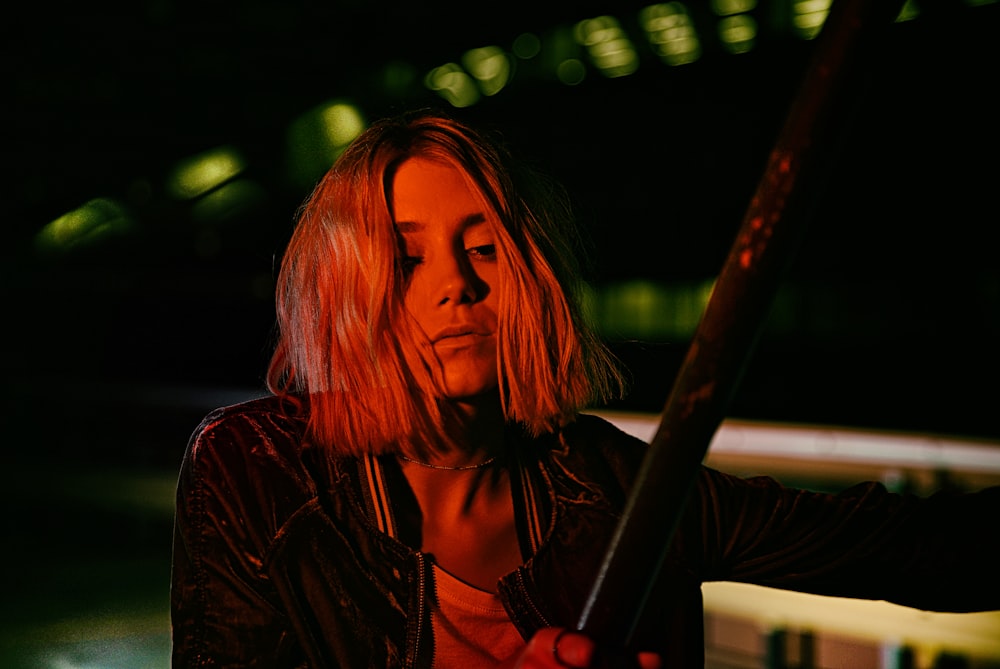 woman in black leather jacket