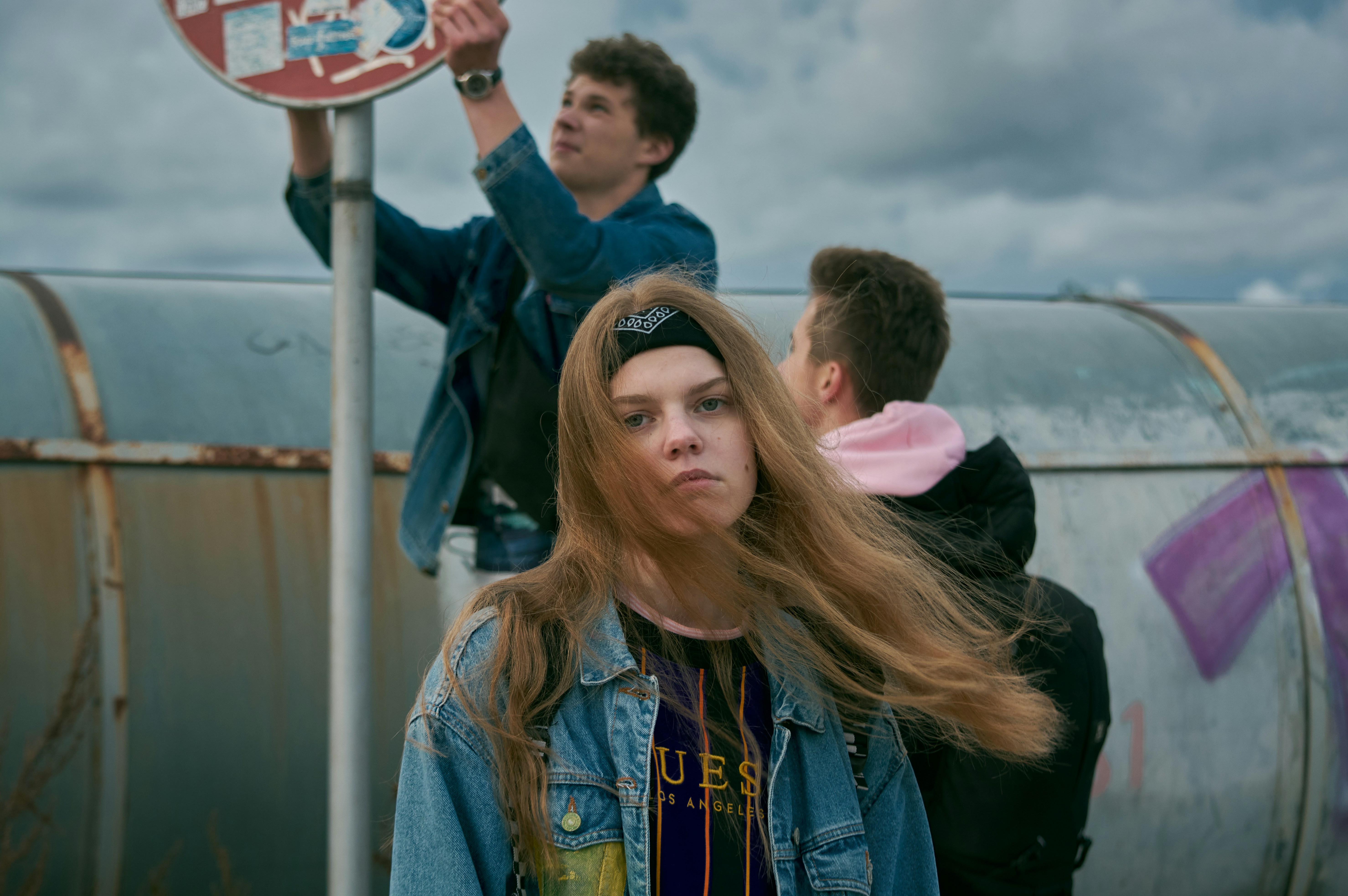 woman in blue denim jacket smiling beside woman in blue denim jacket