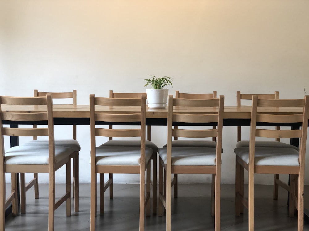 brown wooden table with chairs