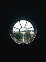 Before and after shots of a window replacement project on a cozy suburban house.