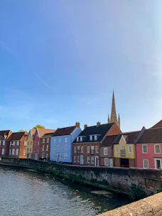 houses near body of water during daytime