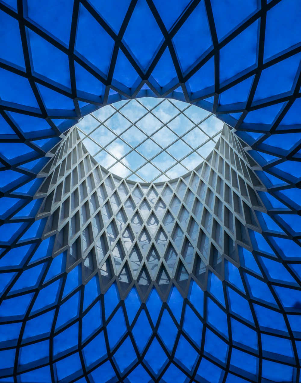 white and blue glass dome building