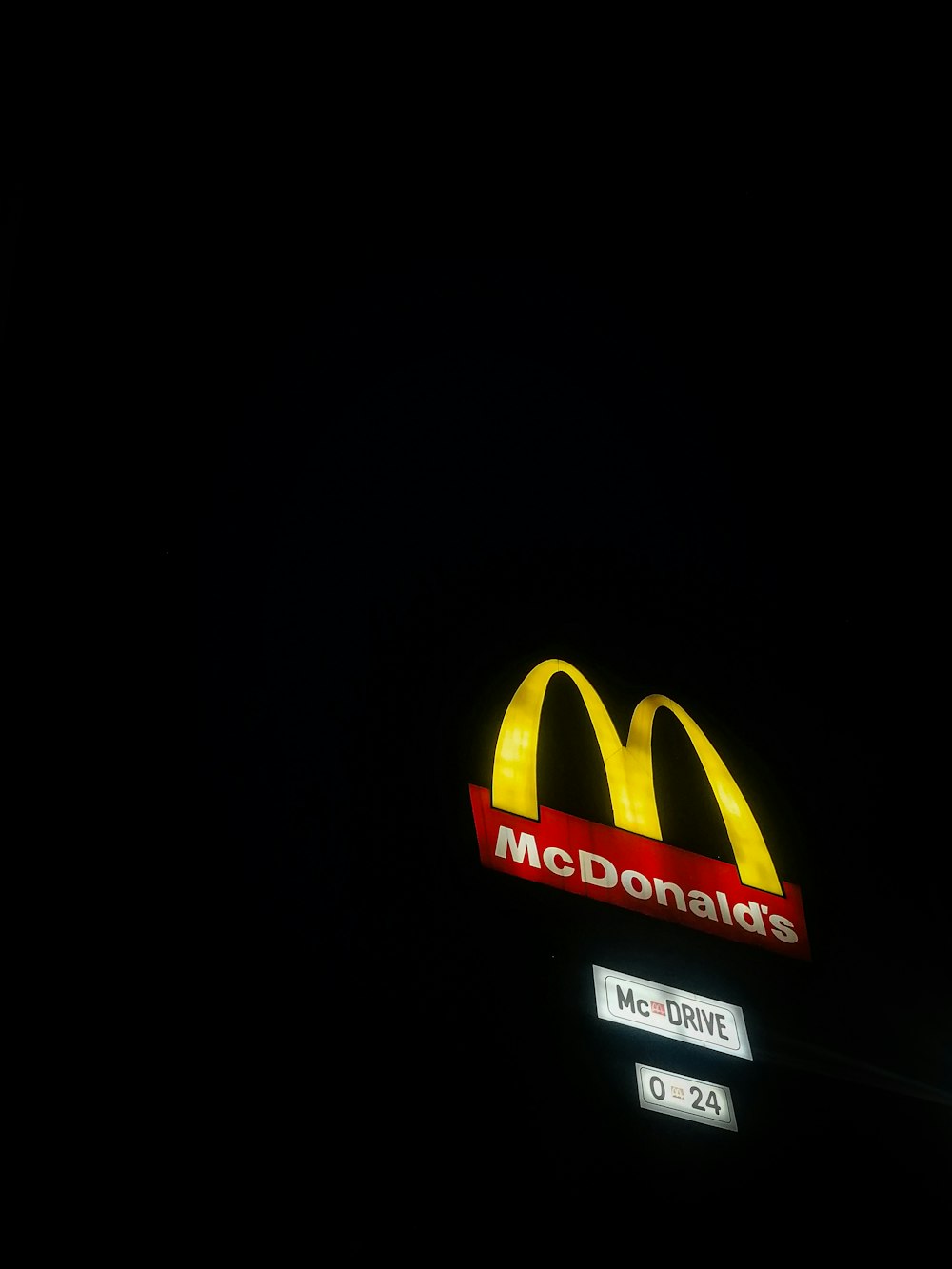 red and yellow mcdonalds signage