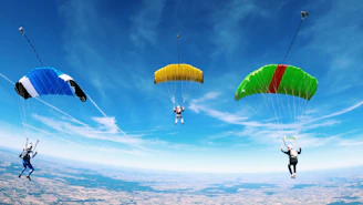 A skydiving club building with vibrant blue skies and colorful parachutes in the foreground.