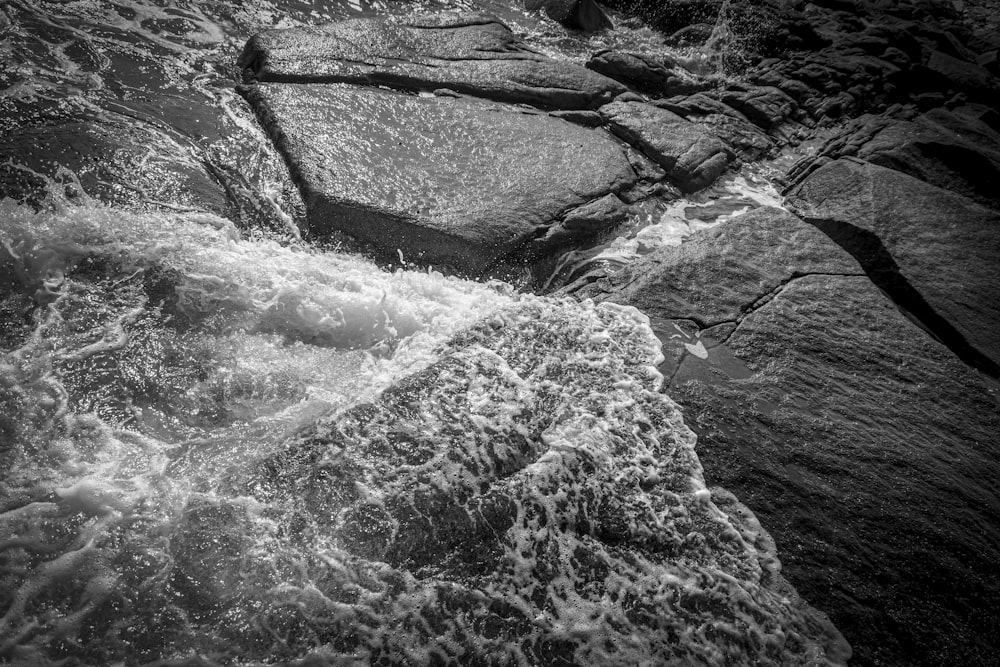 grayscale photo of water waves