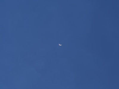 A navy background with a simple astrological chart glowing softly under a starry sky.