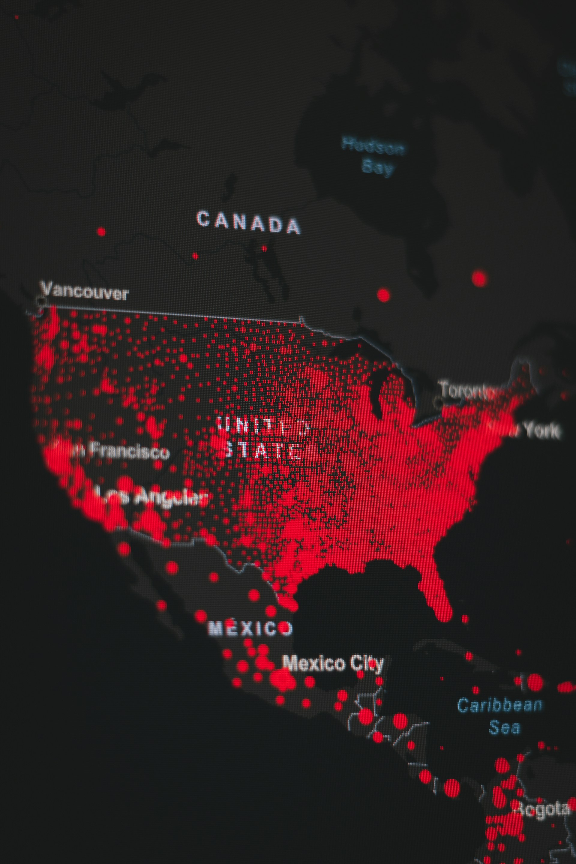 woman wearing yellow long-sleeved dress under white clouds and blue sky during daytime