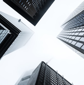 low angle photography of high rise buildings