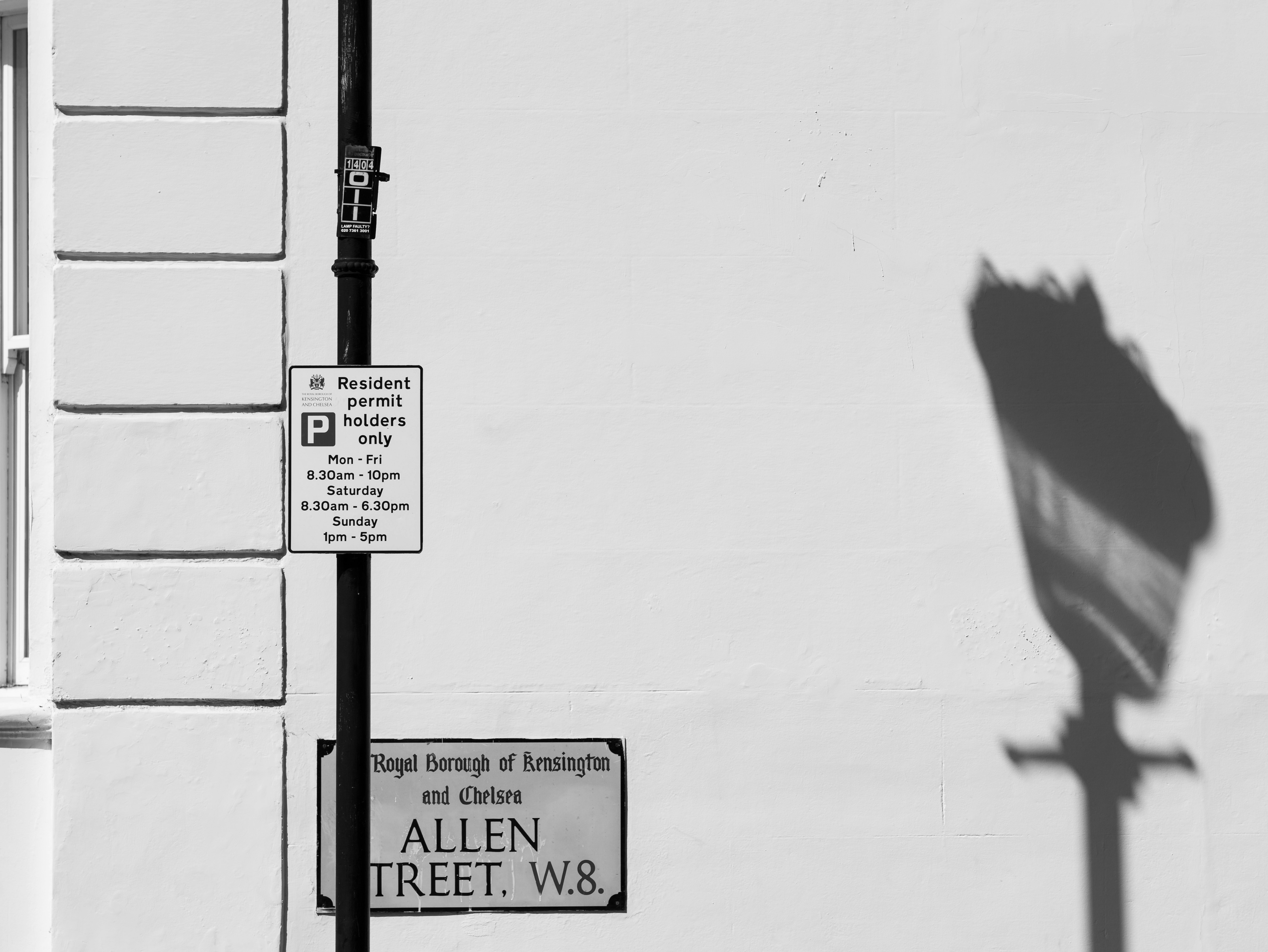 grayscale photo of street sign