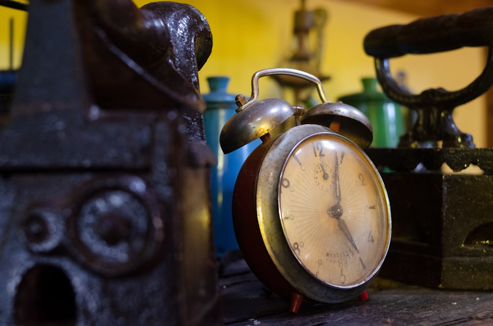 blue and silver alarm clock