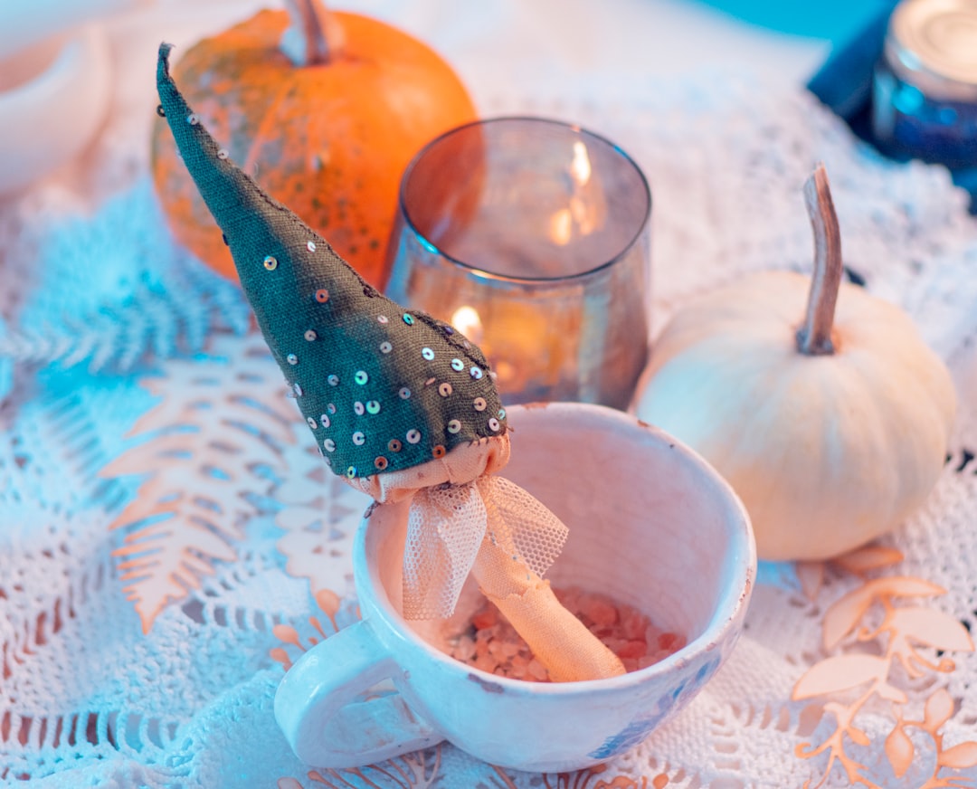 orange fruit in white ceramic bowl