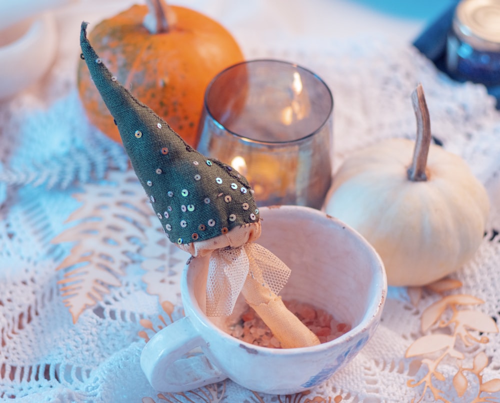 orange fruit in white ceramic bowl