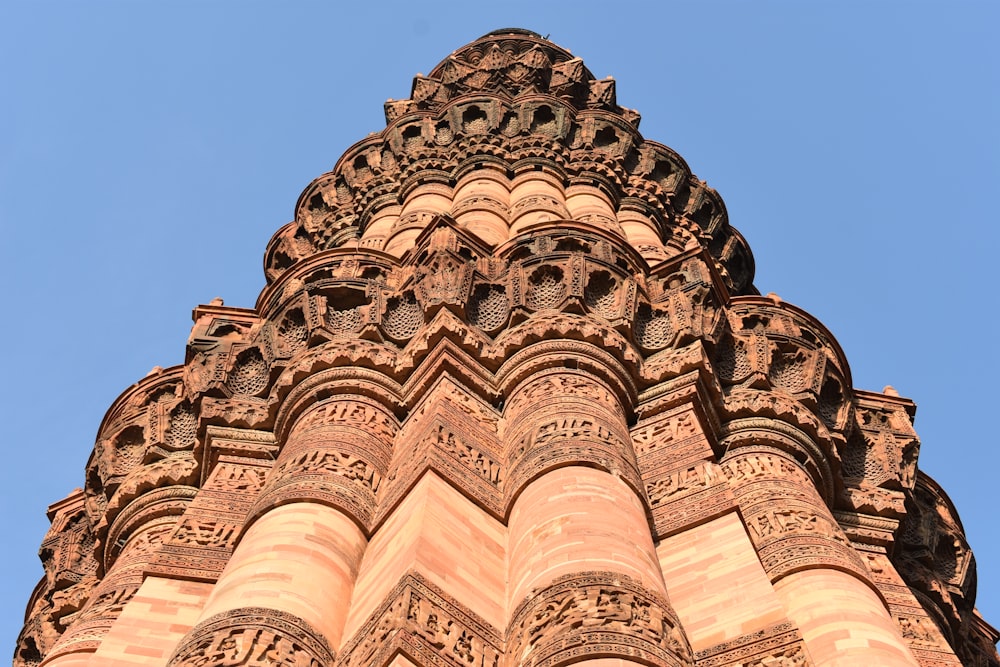 brown concrete building under blue sky during daytime