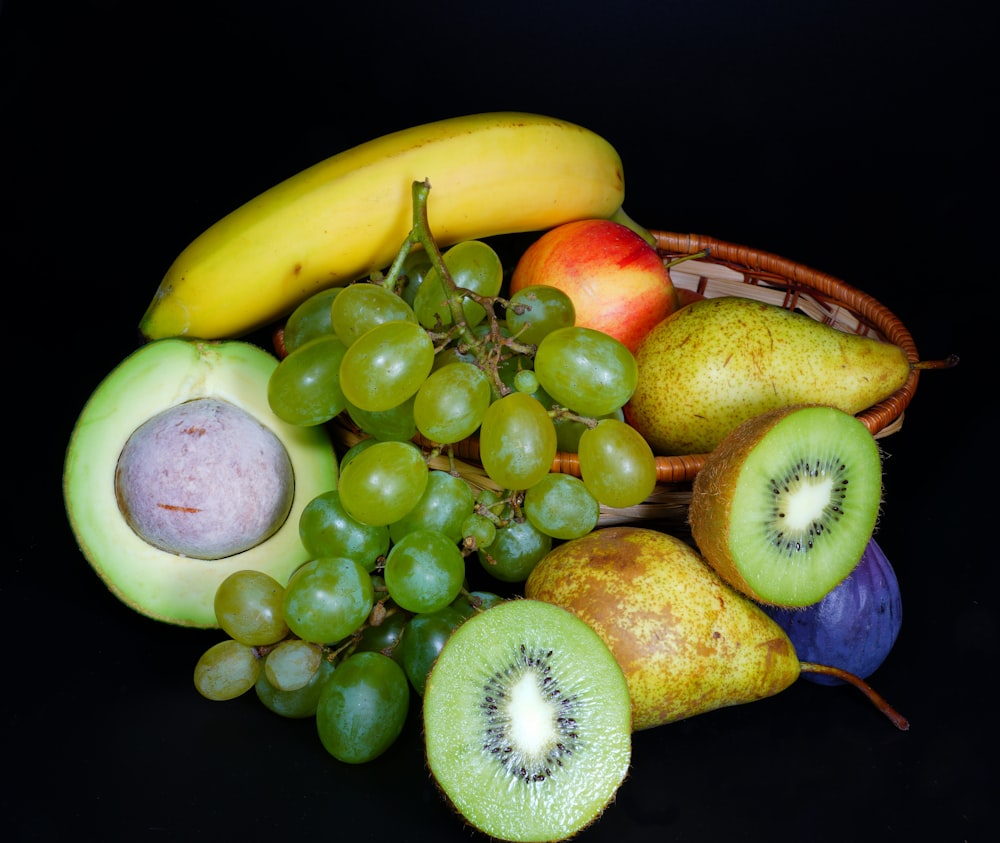 yellow banana fruit and green grapes