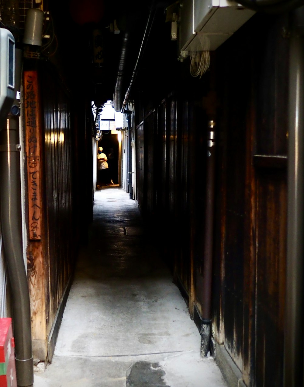 empty hallway with light turned on during daytime