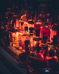clear glass bottles on table