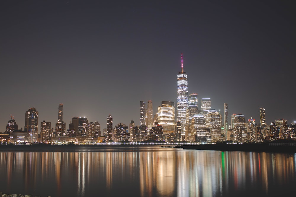 city skyline during night time