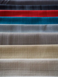 Rows of colorful fabric swatches showcasing diverse material options.