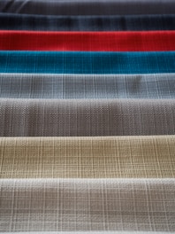 A selection of colorful fabric swatches arranged neatly.