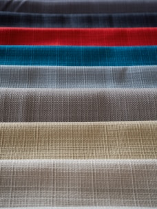 A selection of colorful fabric swatches arranged neatly.