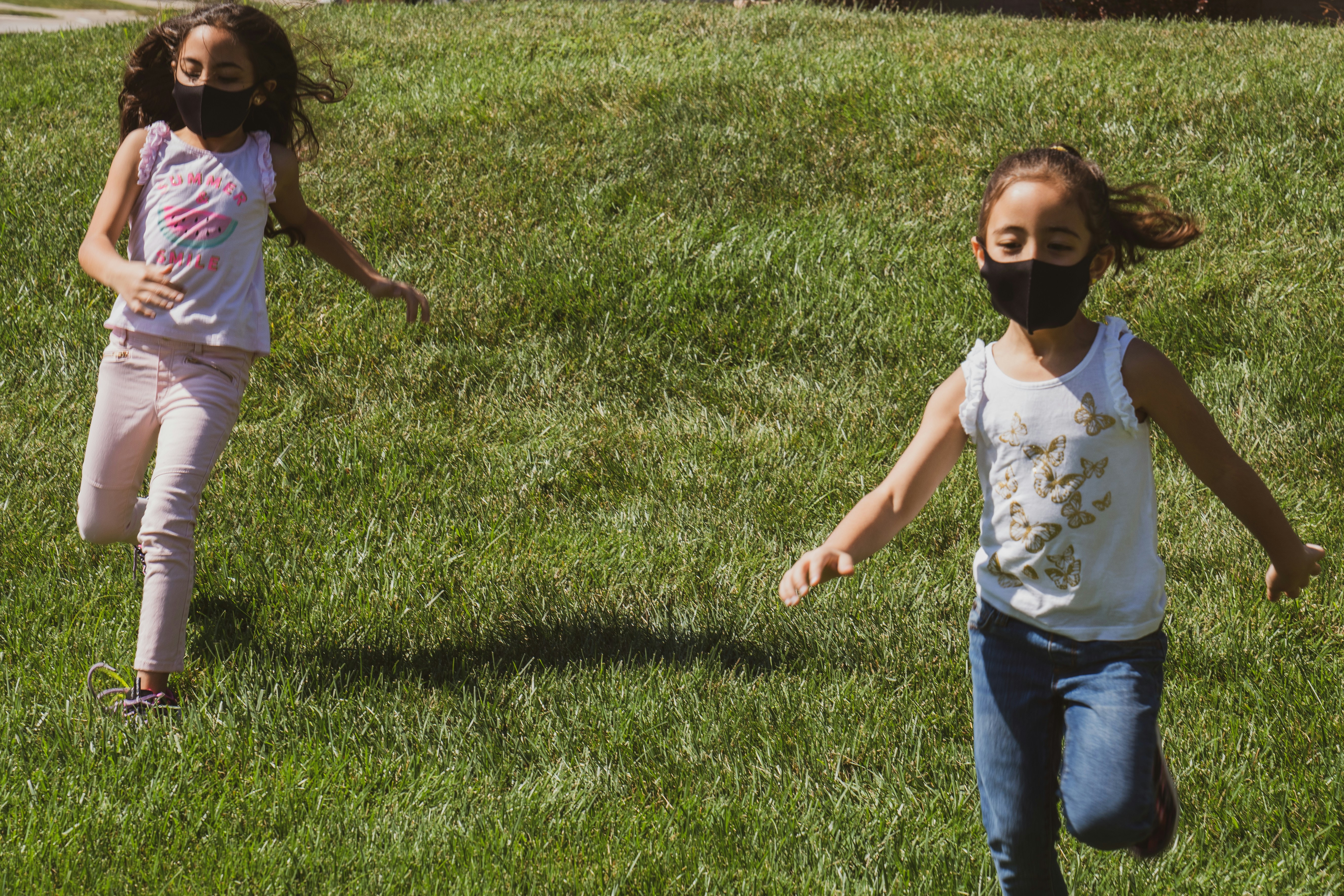 Image showing a family wearing masks outdoors