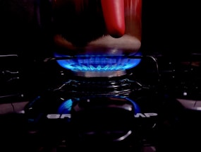 blue and red lighted gas stove