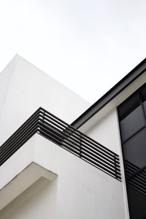 Modern residential building exterior with clean architectural lines.