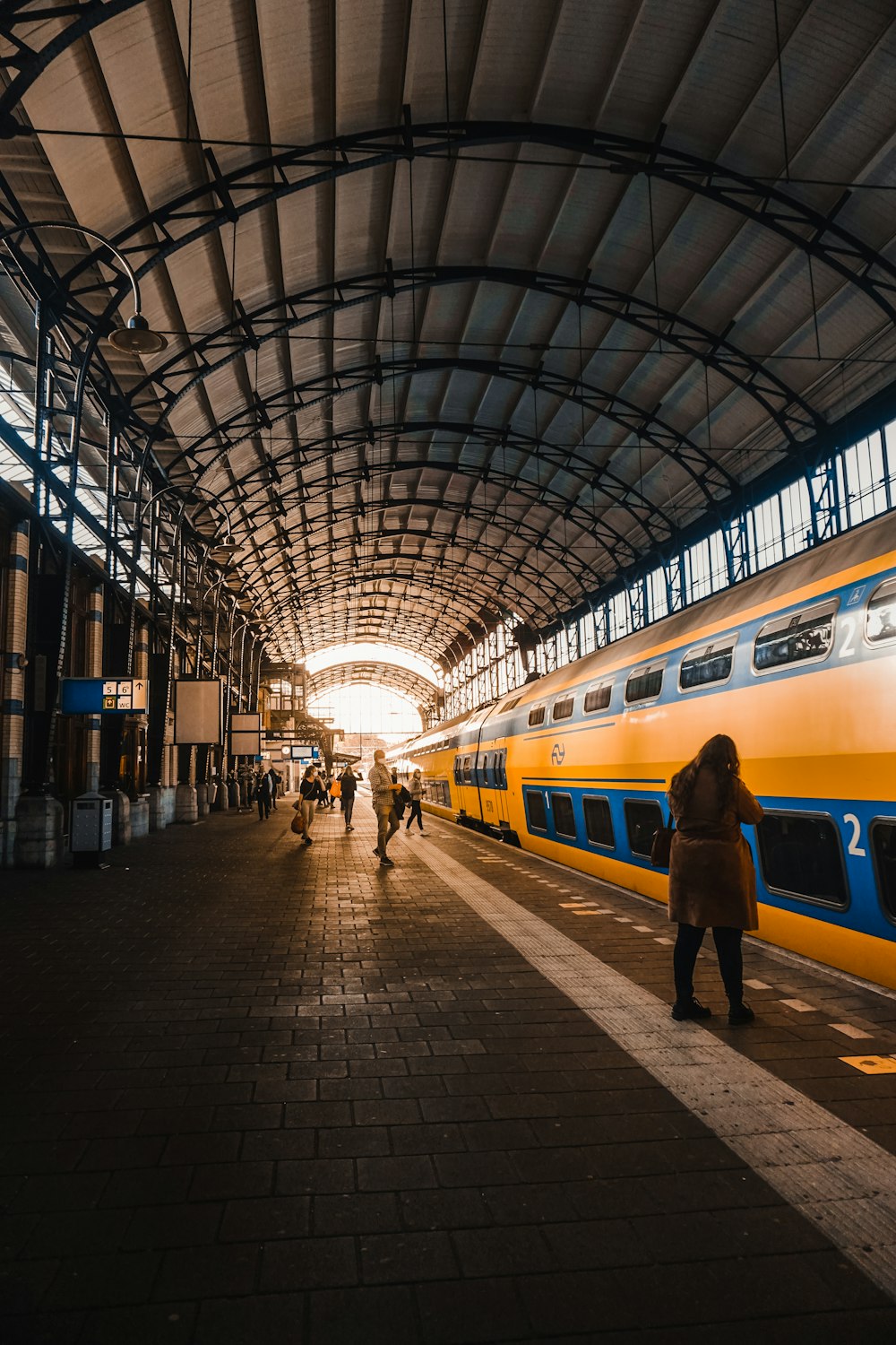 people walking on train station