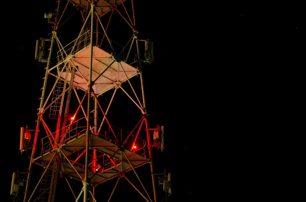 brown and white ferris wheel during night time