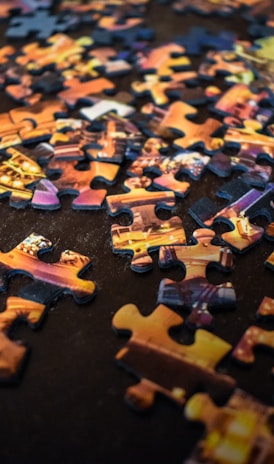 brown and black jigsaw puzzle