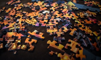 brown and black jigsaw puzzle