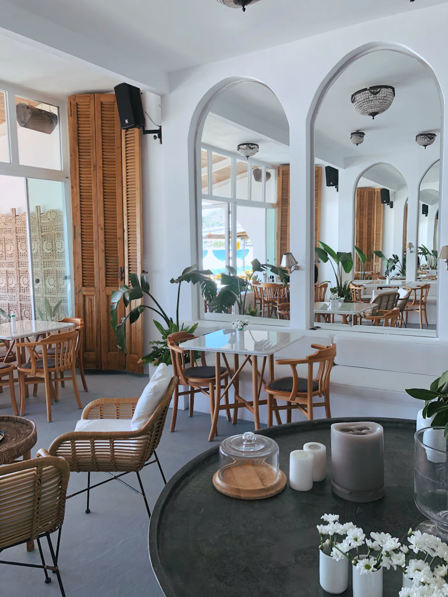 A bright café dining room with wooden tables