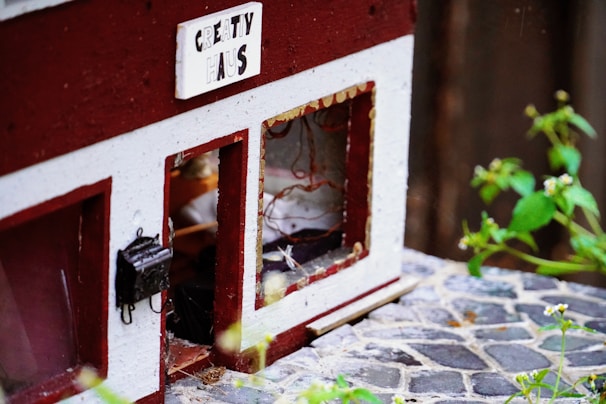 A 3D printed miniature dollhouse accessory displayed creatively.