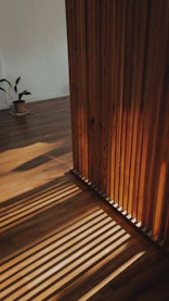 brown wooden staircase with brown wooden railings