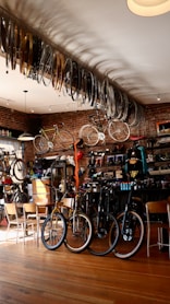 bicycle parked beside brown wooden table