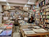 books on brown wooden shelf