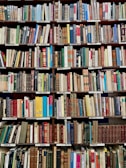 books on brown wooden shelf