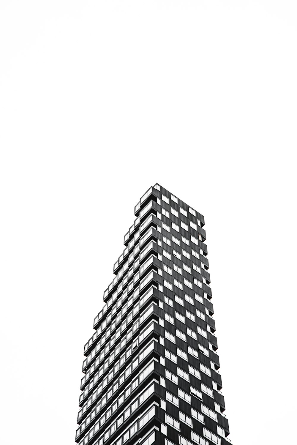 grayscale photo of high rise building