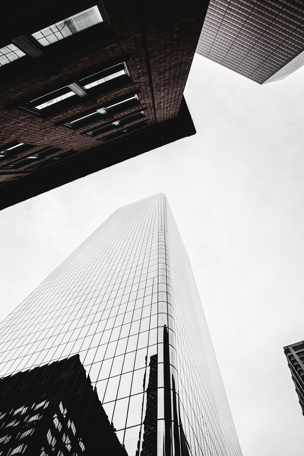 low angle photography of high rise building