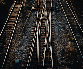 train rail tracks during daytime