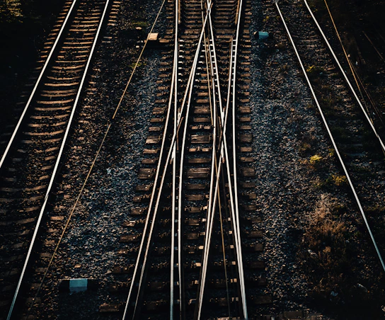 train rail tracks during daytime
