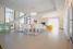white chairs and table on white floor tiles