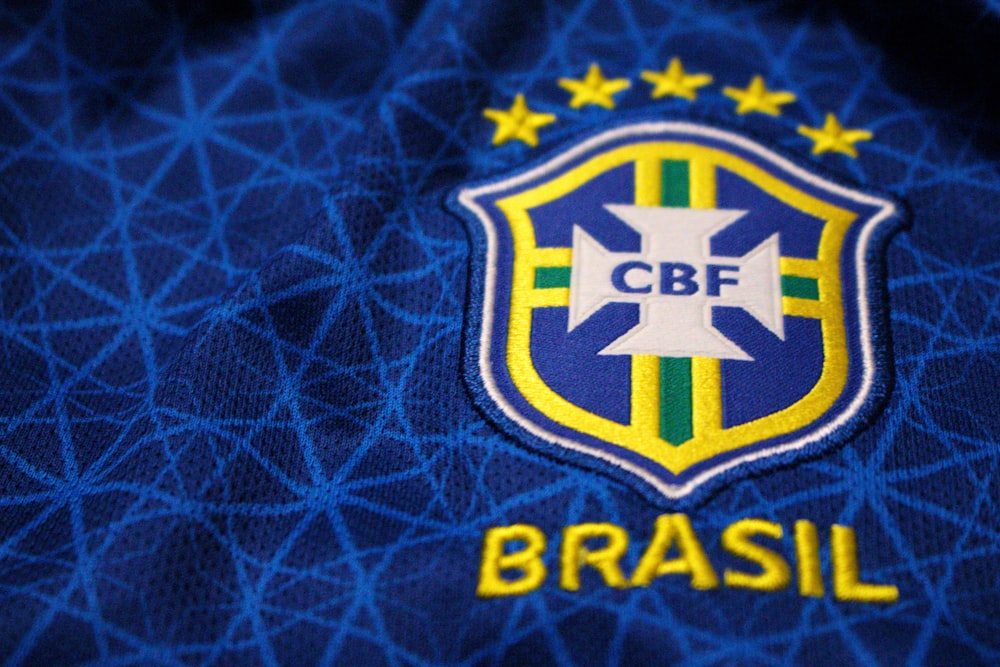 a close up of the logo on a soccer jersey