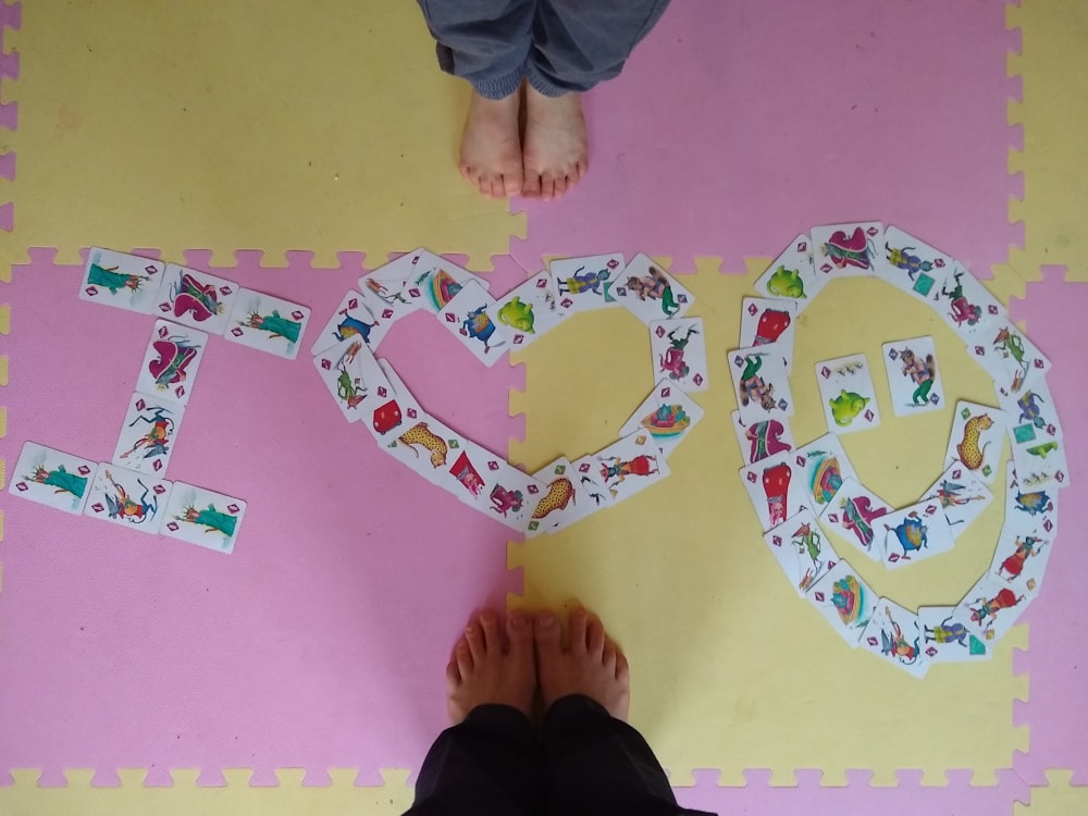 person standing on pink and yellow floor