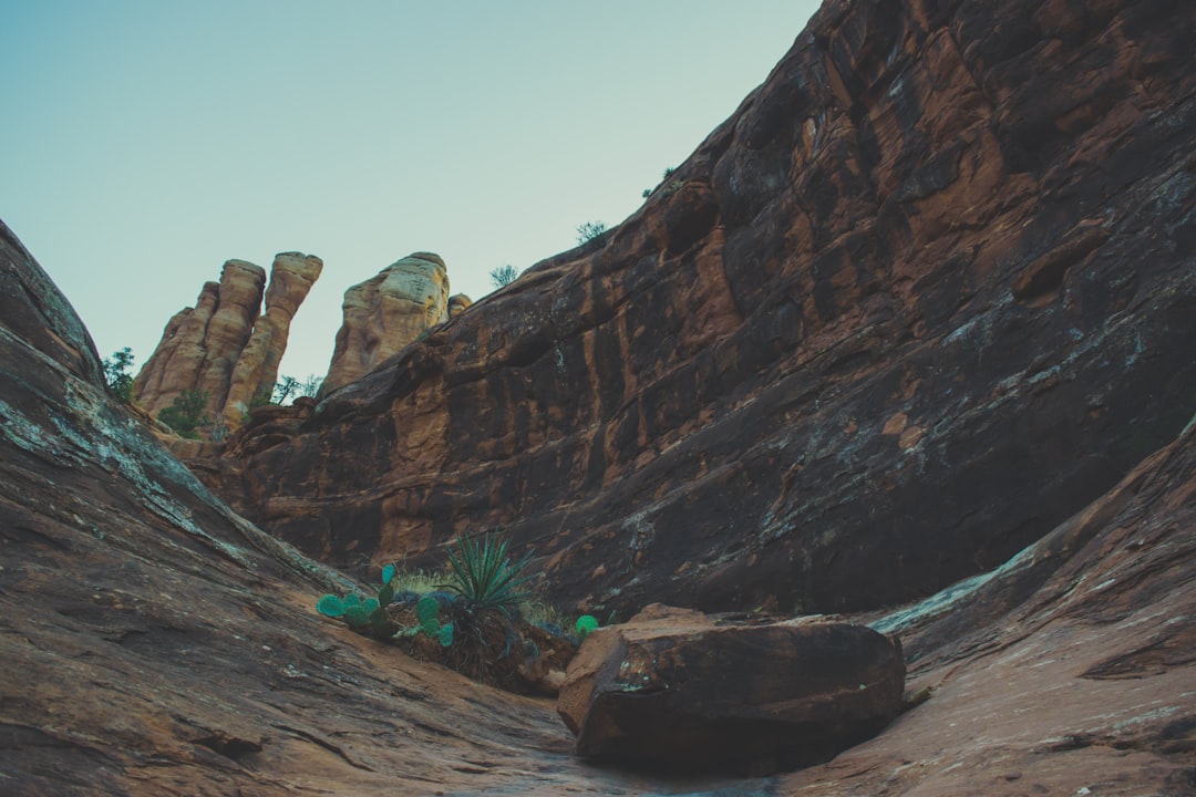 brown rock formation under blue sky during daytime