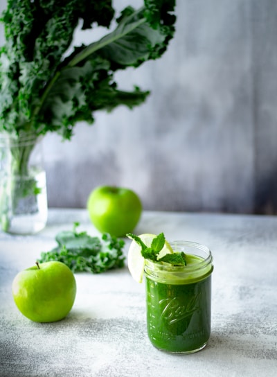 green apple fruit in clear glass cup