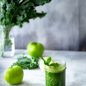 green apple fruit in clear glass cup